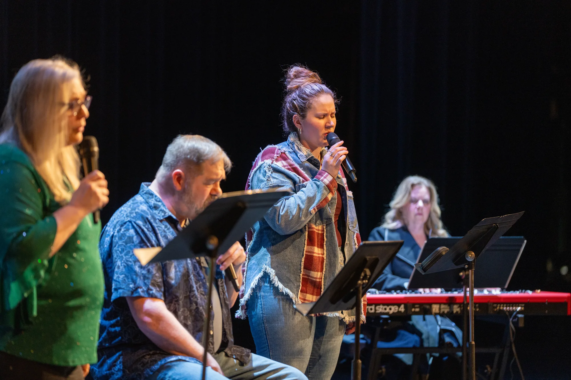 Crossroads worship team leading music during a Sunday service